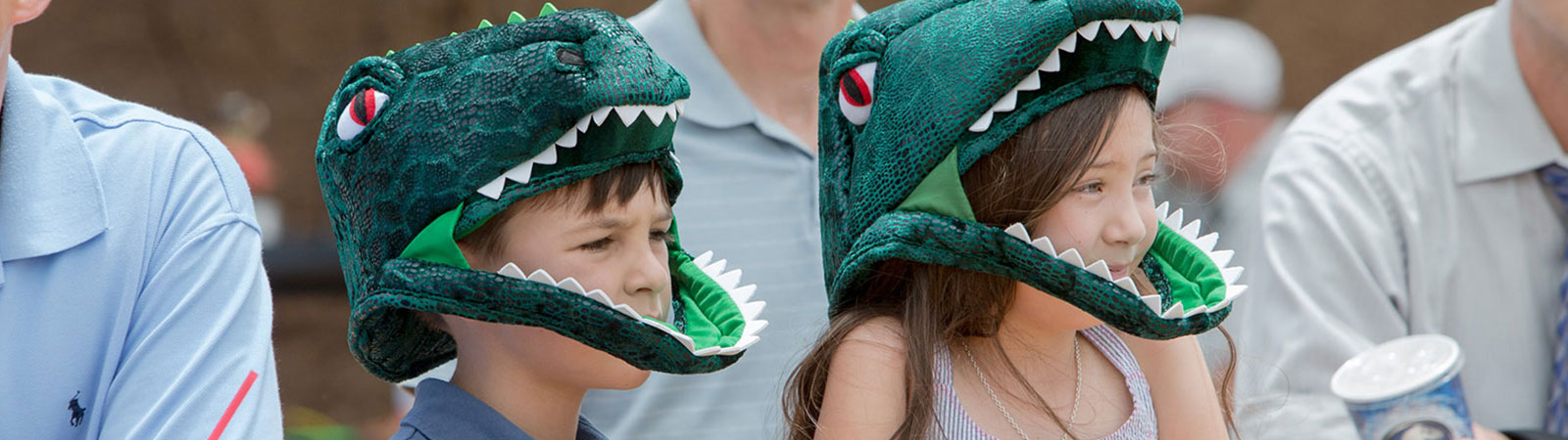 Kids in dinosaur masks