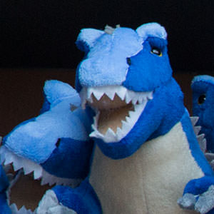 Blue stuffed dinosaur toy